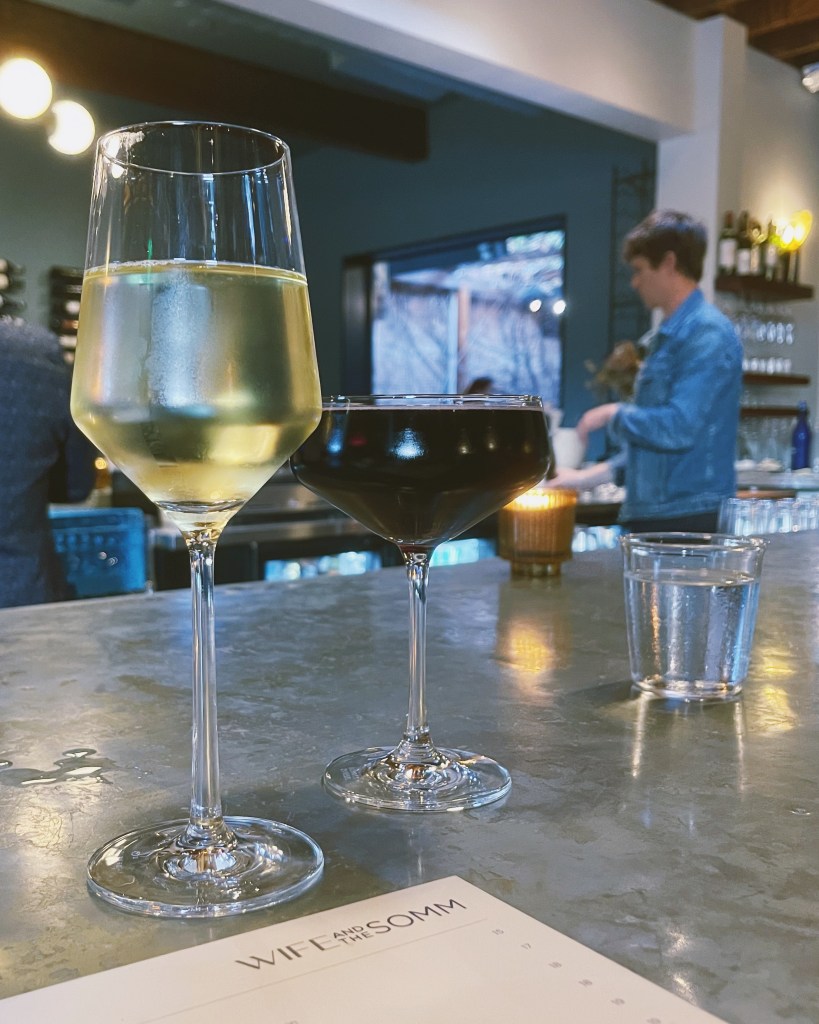 A glass of white wine and a glass of Lambrusco from Wife & The Somm