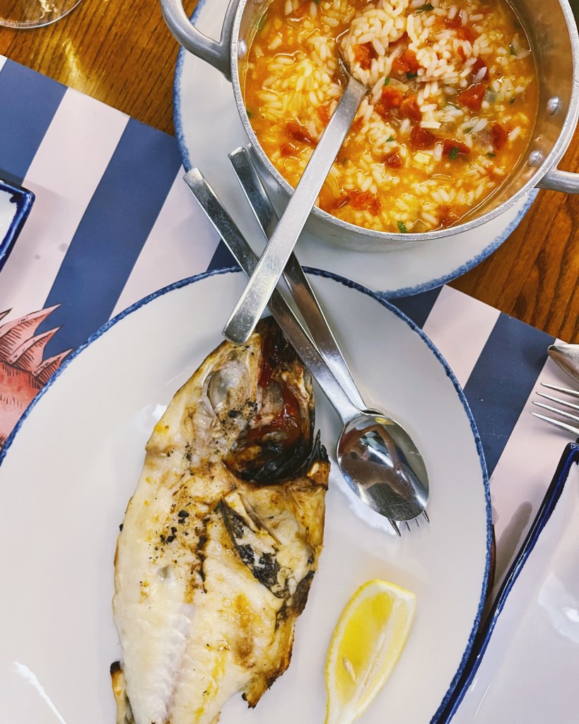 Grilled fish-of-the-day and tomato rice from Sea Me, a seafood restaurant in the heart of Lisbon, Portugal