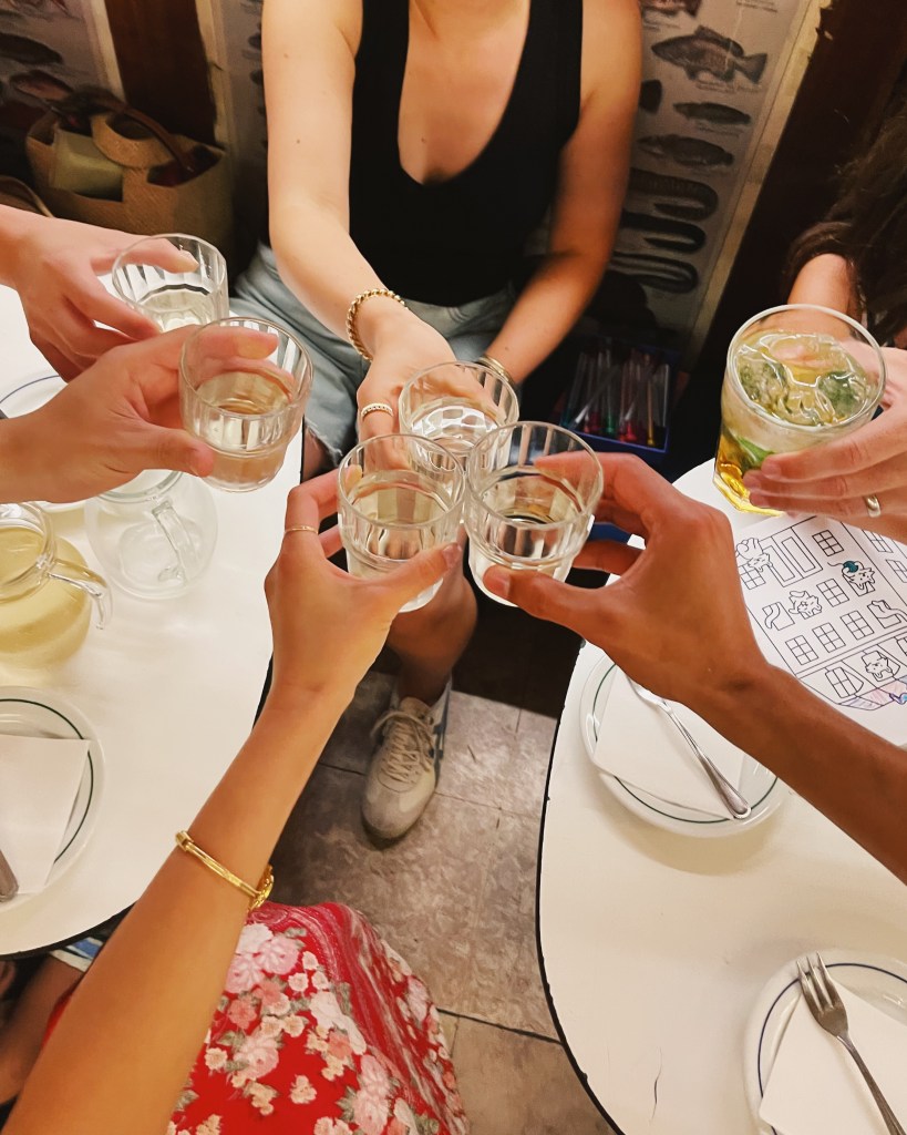 House white wine out of jugs and tumblers at Sole e Pesca in Lisbon, Portugal